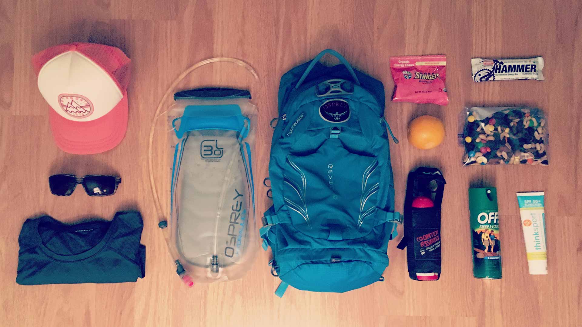 hiking gear laid out on floor